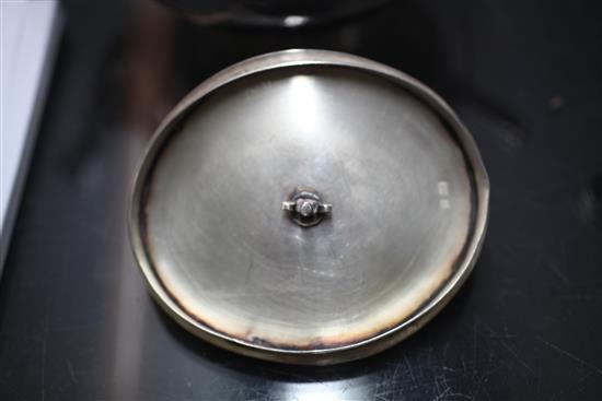 A stylish 1970s silver four piece tea set with tea strainer by Graham Watling of Lacock, gross 51 oz.